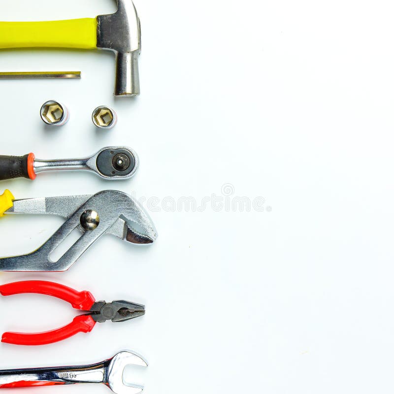 Top view of Working tools,wrench,socket wrench,hammer,screwdriver,plier,electric drill,tape measure,machinist square and safety g