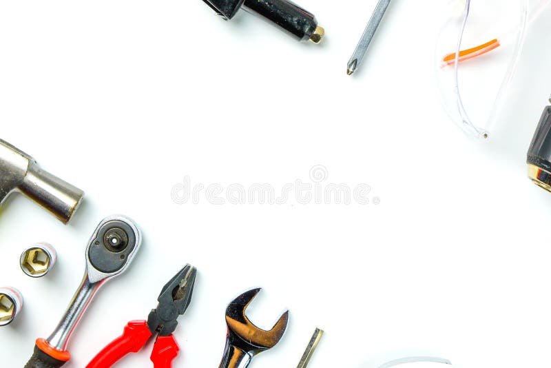 Top view of Working tools,wrench,socket wrench,hammer,screwdriver,plier,electric drill,tape measure,machinist square and safety g