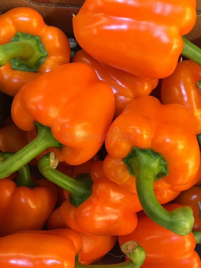 Top view yellow peppers in a pile