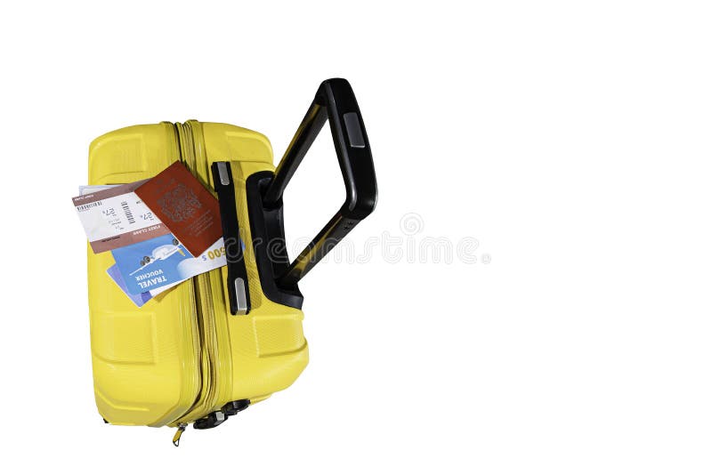 The top view of the yellow suitcase with a sports boarding pass is placed on the bag while traveling royalty free stock photography The top view of the yellow suitcase with a sports boarding pass is placed on the bag while traveling royalty free stock photography