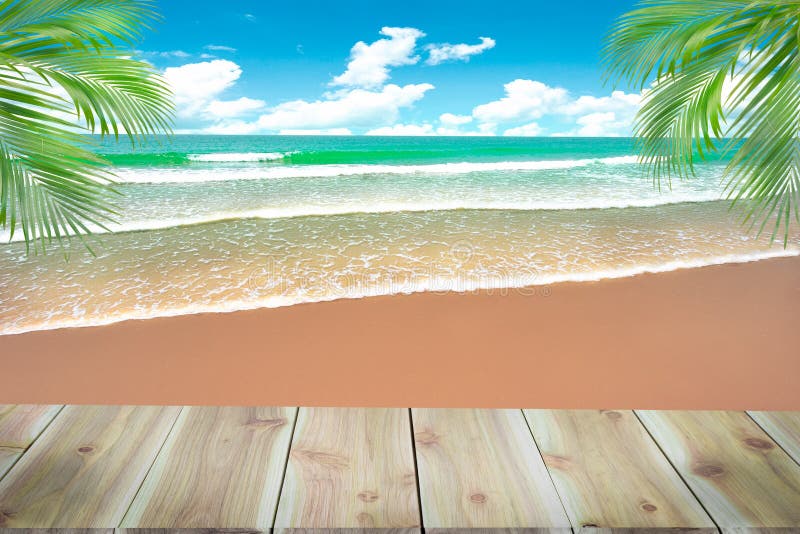 Top of wood table with blurred sea and coconut tree background - royalty free stock image Top of wood table with blurred sea and coconut tree background - royalty free stock image