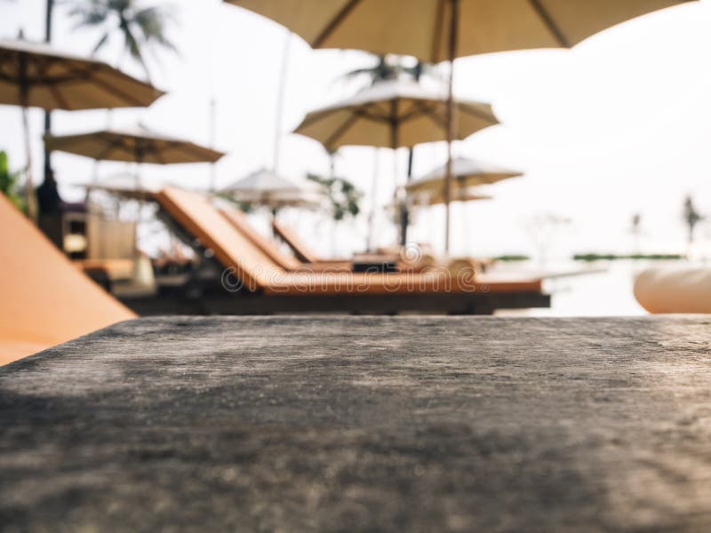 Top of wooden table with Beach chair, Summer holiday Background