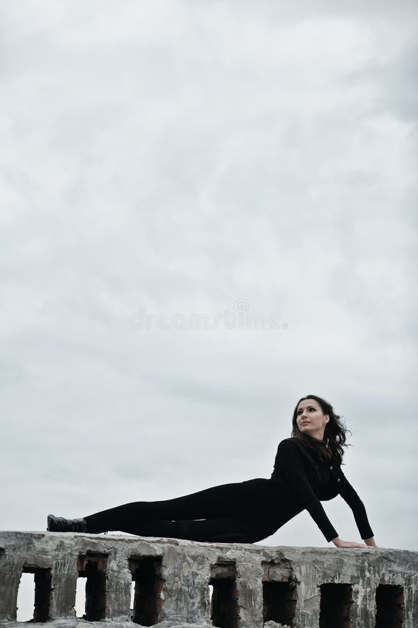 Portrait of young brunette girl over the sky with a lot of copy space. Portrait of young brunette girl over the sky with a lot of copy space