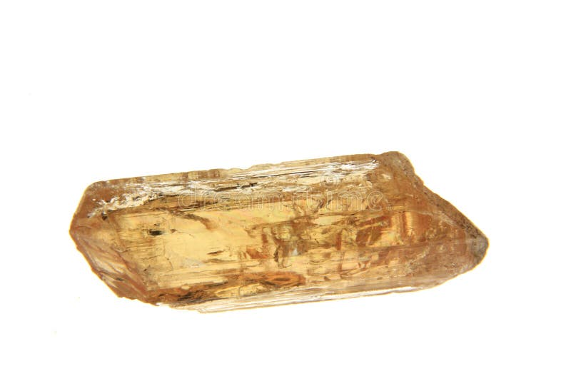 Brown-yellow colored topaz crystal from Brazil - uncut rough stone