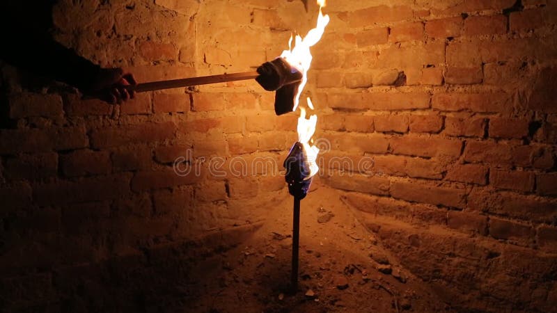 Flaming Torch On Building At Night Stock Video - Video of torch, wall