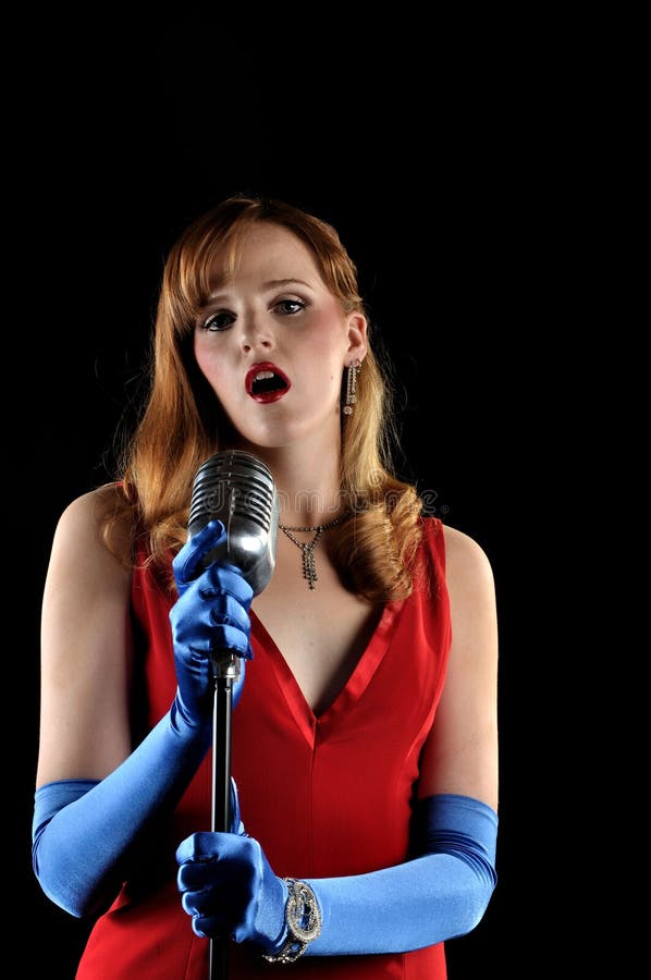 Torch Singer stock photo. Image of dress, lighting, sing 13562406