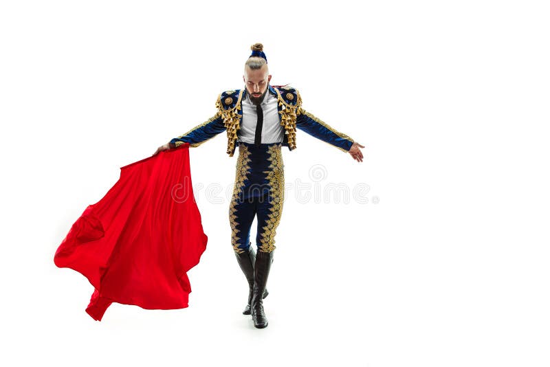 Toreador in blauw en gouden kostuum of typische Spaanse die stierenvechter over wit wordt geïsoleerd
