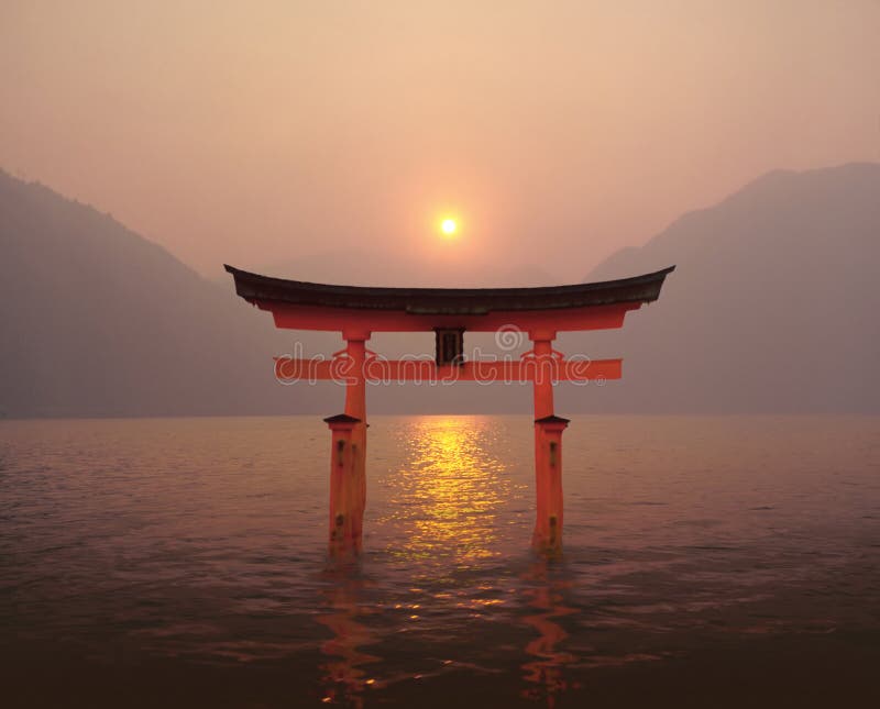 Starting from my own snapshots an illustration of zen quietness through Miyajima shrine torii in Japan at sunrise. Starting from my own snapshots an illustration of zen quietness through Miyajima shrine torii in Japan at sunrise.