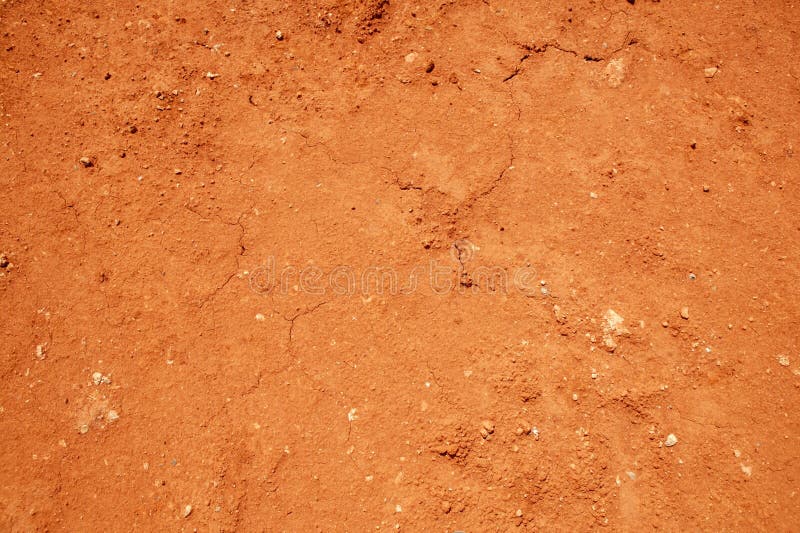 Torkad red för bakgrund smutsar lera textur fotografering för bildbyråer