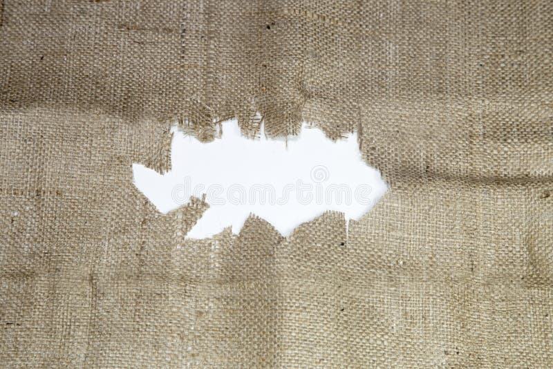 Torn burlap with space for text showing stock image