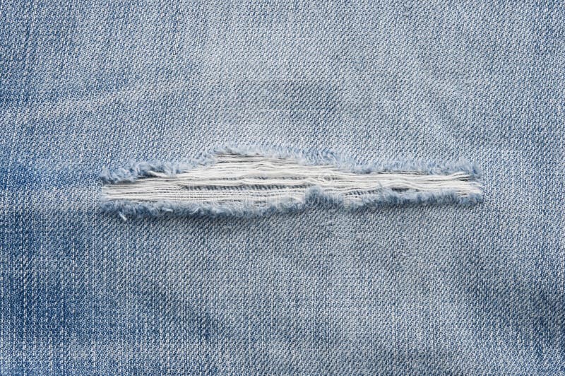 Frayed and torn old jeans stock image. Image of color - 4491903