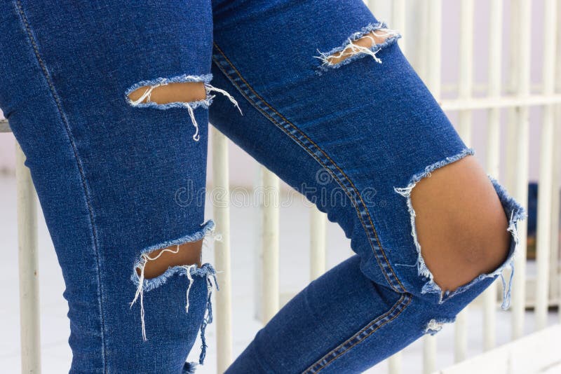 Torn jeans with jail. stock image. Image of pattern, denim - 73244721