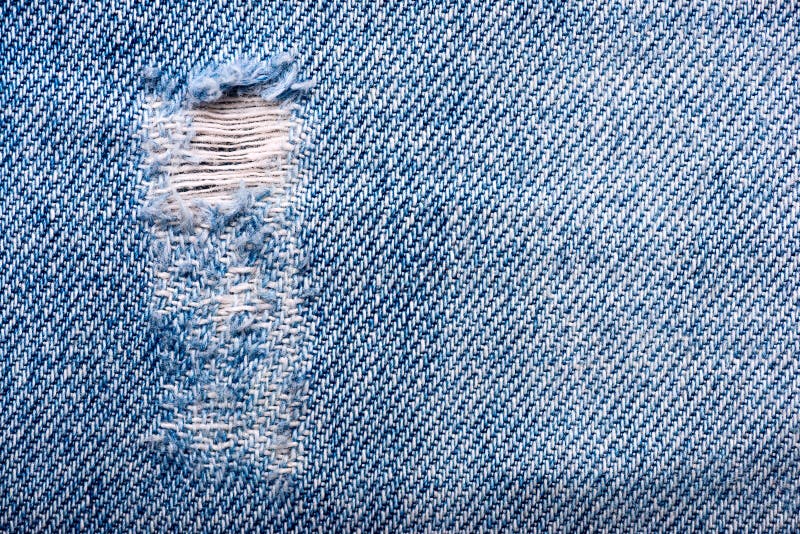 Blue jeans torn fabric stock image. Image of macro, colors - 33160987