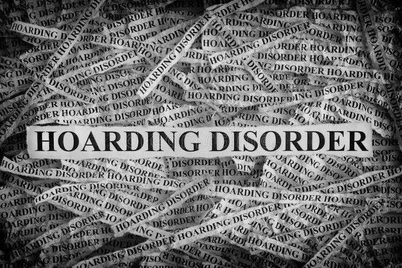 Torn pieces of paper with the words Hoarding Disorder