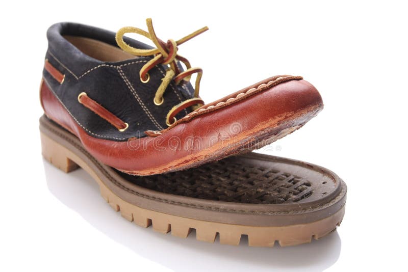 Torn Shoe on a White Background Isolate. Stock Photo Image of