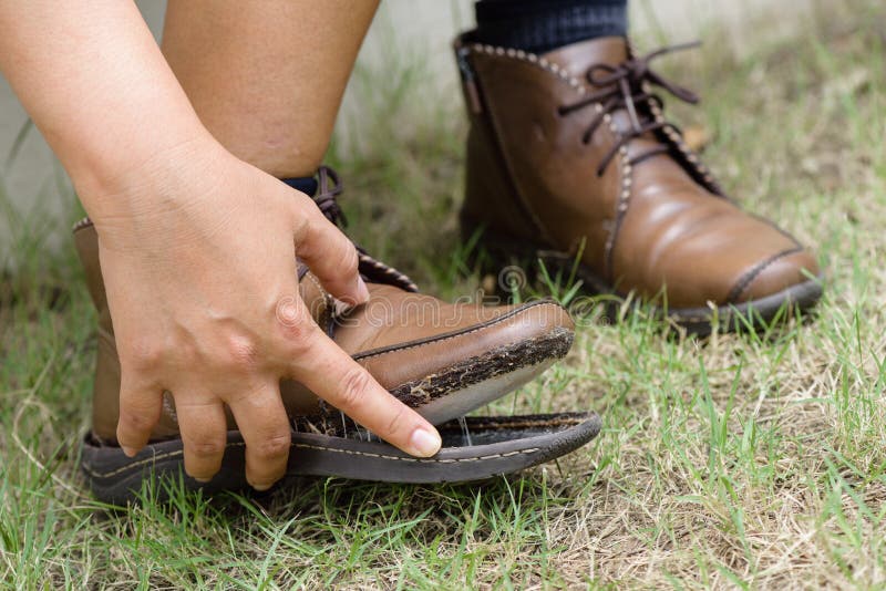 Torn women leather boots stock image. Image of shoelace - 186335831