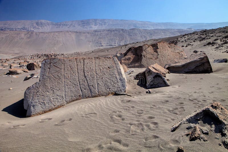 Peru, Toro Muerto Petroglyphs, more than 5000 such petroglyphs of desert Though the cultural orgins of this site remain unknown, most archeologist date to the period of Wari domination, 1200 years ago. Peru, Toro Muerto Petroglyphs, more than 5000 such petroglyphs of desert Though the cultural orgins of this site remain unknown, most archeologist date to the period of Wari domination, 1200 years ago