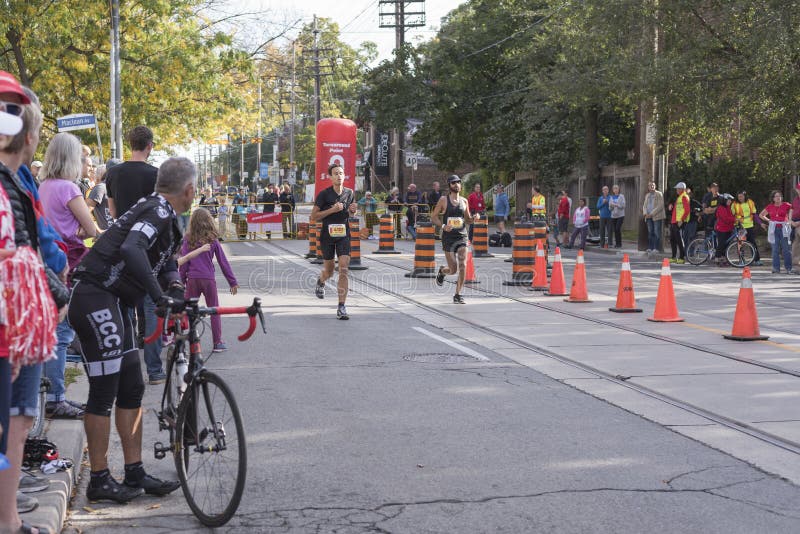 TORONTO, on/CANADA OCT 22, 2017 Marathon Runners Passing the Editorial Image Image of