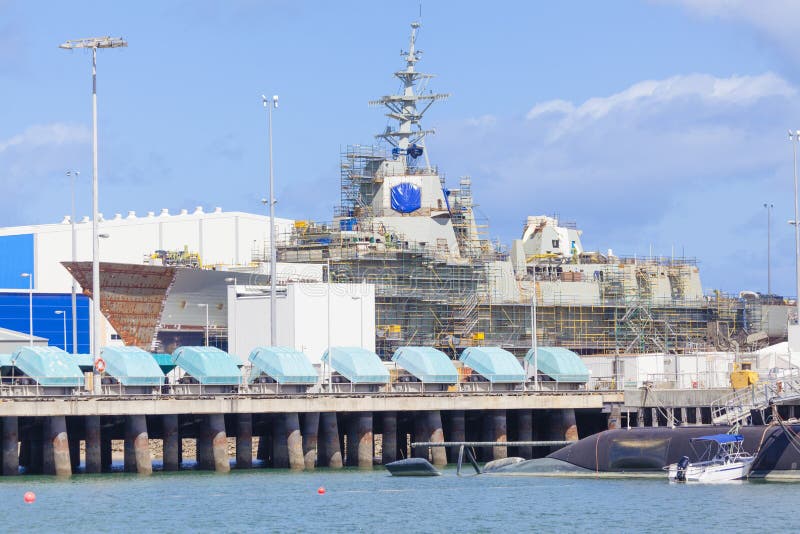 Modern destroyer under construction in a naval shipyard. Modern destroyer under construction in a naval shipyard