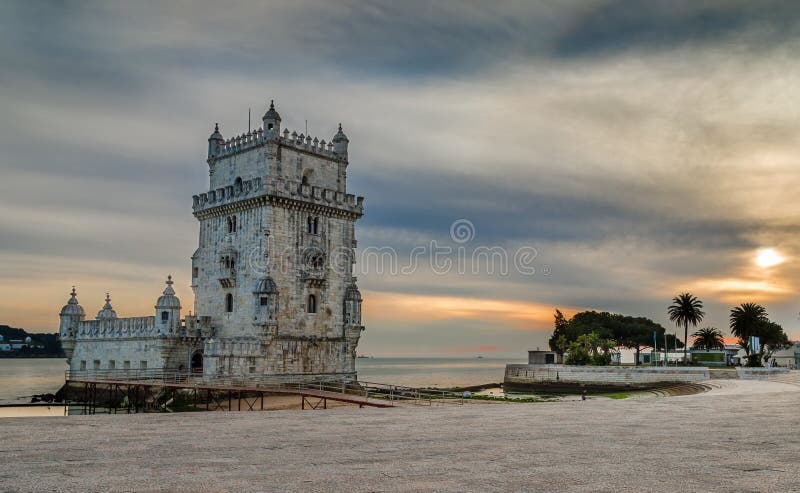 Torre de Belem is fortified medieval tower located at the mouth of the Tagus River in Lisbon, Portugal. Was built in the early 16th century in Portuguese Manueline style. Torre de Belem is fortified medieval tower located at the mouth of the Tagus River in Lisbon, Portugal. Was built in the early 16th century in Portuguese Manueline style.