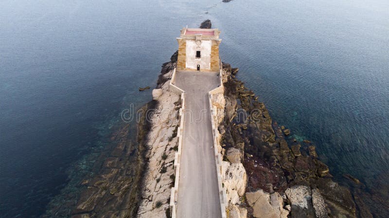 The Ligny Tower (Torre di Ligny) and the sea in Trapani, Sicily. The Ligny Tower (Torre di Ligny) and the sea in Trapani, Sicily.