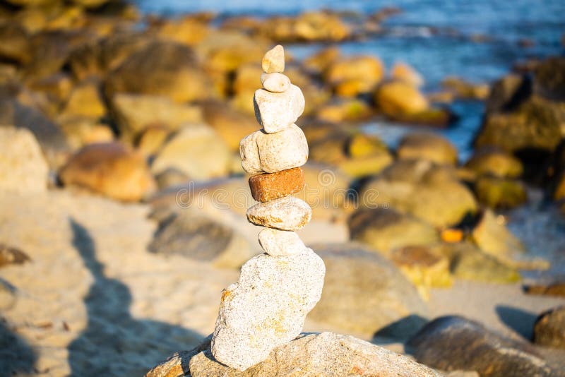 Stone tower by the sea, balance, balance, inner peace, energy. Stone tower by the sea, balance, balance, inner peace, energy