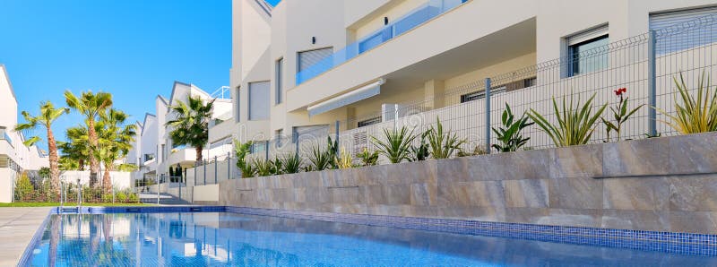 Banner view modern residential complex with swimming pool