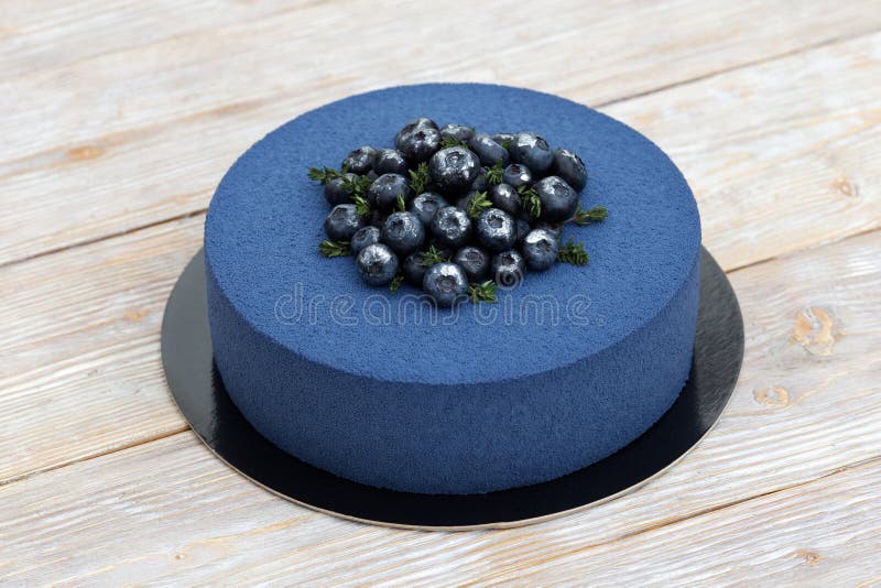 Torta Azul Del ` S Del Hombre De La Crema Batida Imagen de archivo - Imagen  de dulce, postre: 86616103