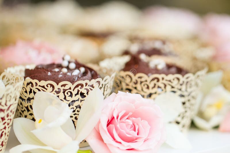 Wedding decor table setting with wedding cake made of cupcake. Wedding decor table setting with wedding cake made of cupcake