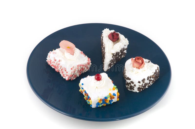 Fancy cakes with cream and colored speckles. Fancy cakes with cream and colored speckles