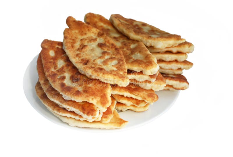 Torte (Pierogi, pirogi), russisches Traditionsgebäck lizenzfreie stockbilder Torte (Pierogi, pirogi), russisches Traditionsgebäck lizenzfreie stockbilder