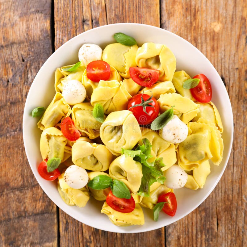 Tortellini with mozzarella stock photo. Image of food - 224796502