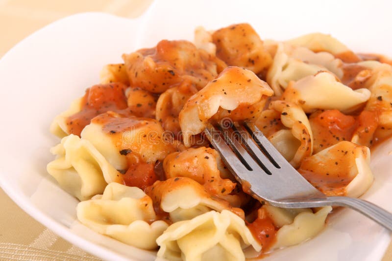 Tortellinis marinara sauce stock photo. Image of cheese 32038032