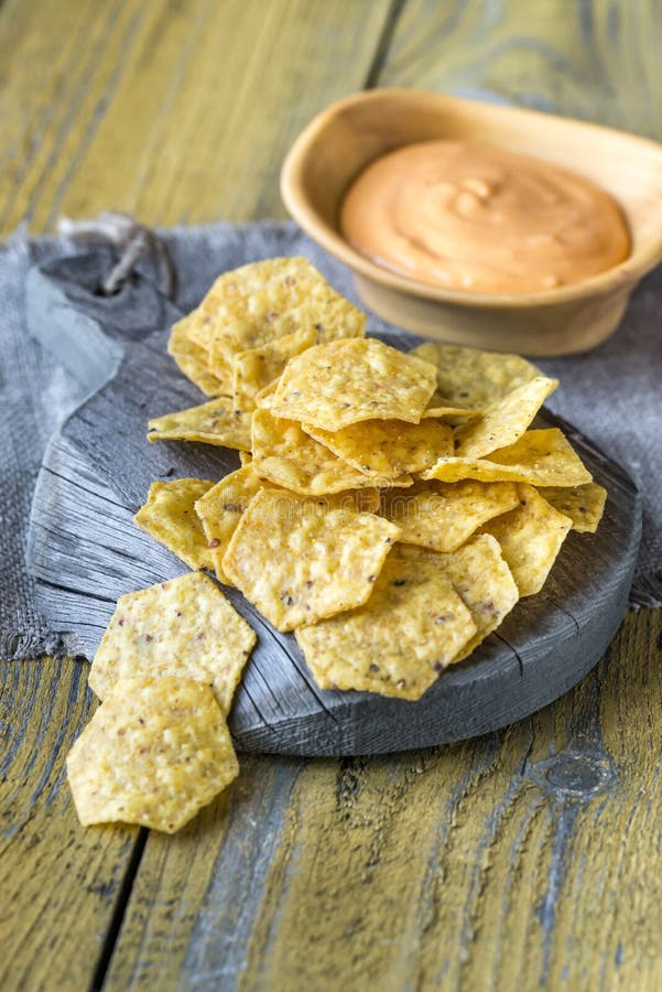 Tortilla Chips with Chile Con Queso Stock Photo Image of board, copy