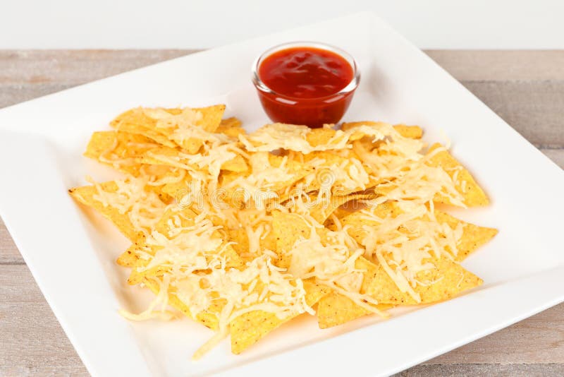 Tortilla chips with sauce stock photo. Image of chilli 103444100