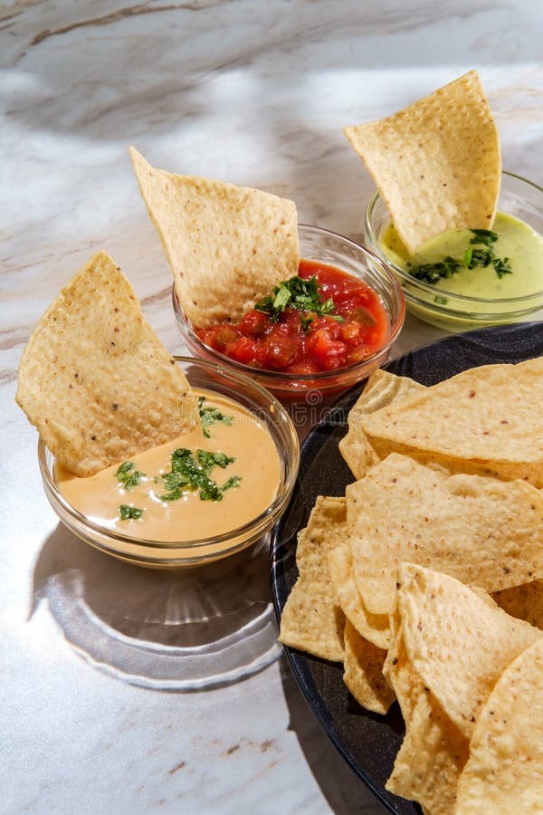 Tortilla Chips Salsa Dips stock image. Image of cheese - 192613165