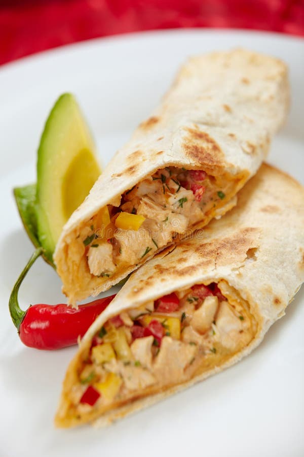 Tortilla Wraps with Fried Chicken Meat and Vegetables Stock Image
