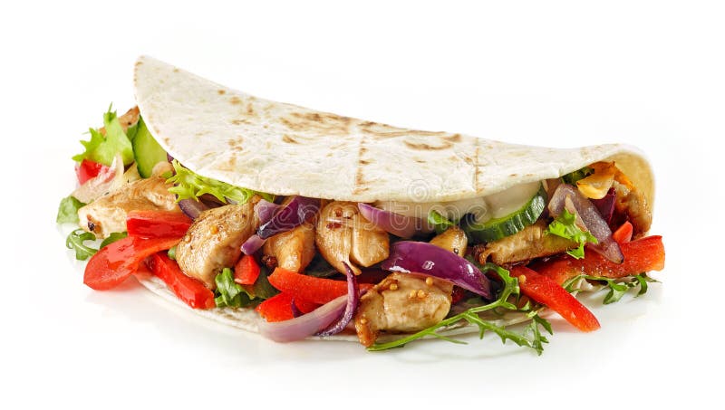 Tortilla περικάλυμμα με το τηγανισμένα κρέας και τα λαχανικά κοτόπουλου στοκ φωτογραφία με δικαίωμα ελεύθερης χρήσης Tortilla περικάλυμμα με το τηγανισμένα κρέας και τα λαχανικά κοτόπουλου στοκ φωτογραφία με δικαίωμα ελεύθερης χρήσης