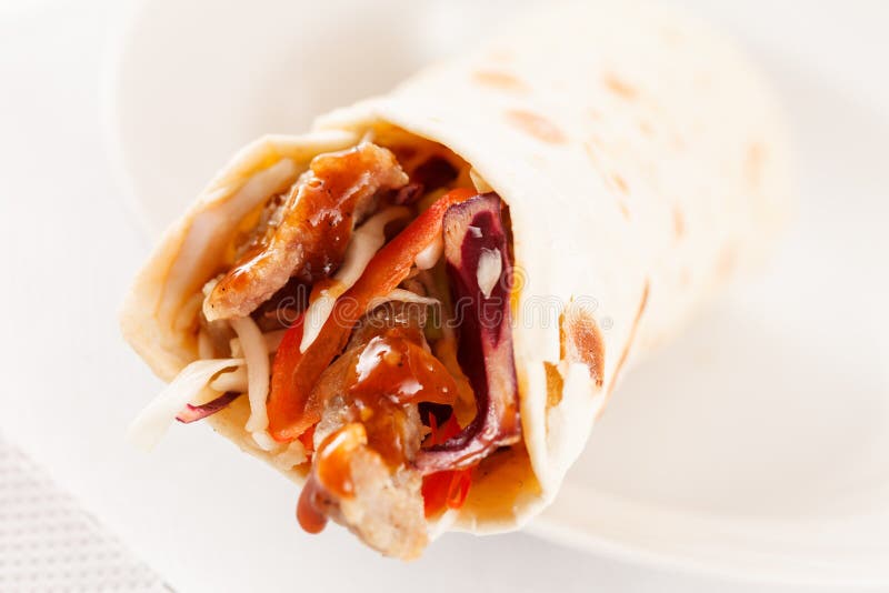 Tortilla fajita wraps with meat and vegetables. Tortilla fajita wraps with meat and vegetables