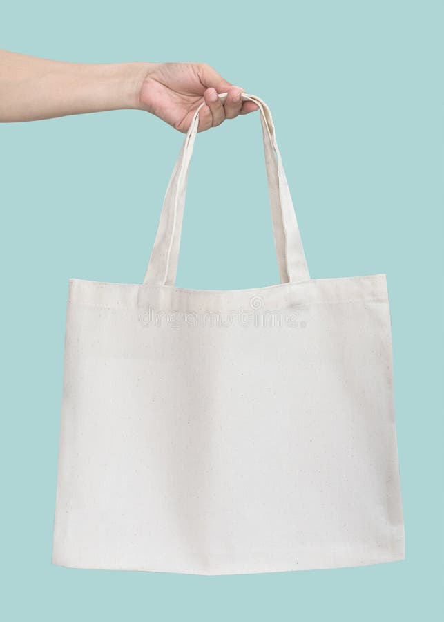 Tote bag canvas white cotton fabric cloth for eco shoulder shopping sack mockup blank template isolated on pastel green or blue