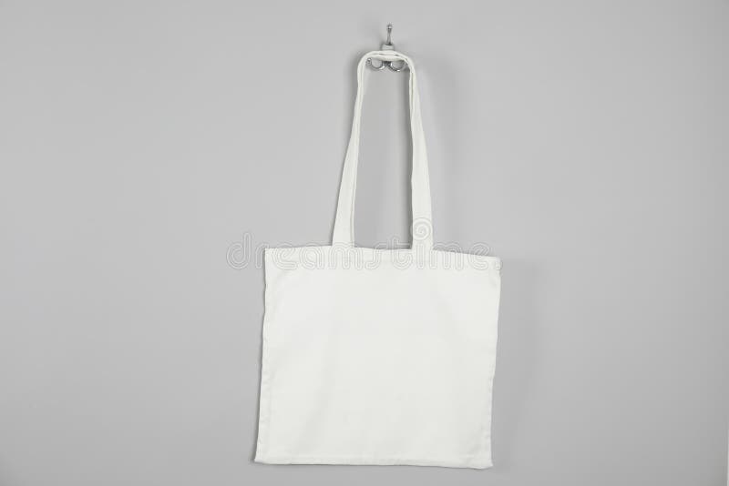 Download Tote Bag Hanging On Grey Wall. Mock Up Stock Photo - Image ...