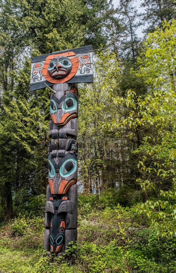 Colorful Totem Pole in Vancouver Stock Photo - Image of indigddd ...