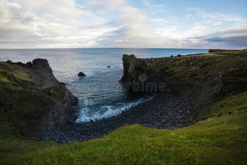 Landscape With Cliff And Mountain Range At The Ocean Light Reflections