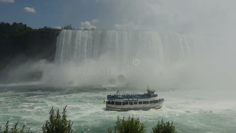 Tour boat near Niagara Falls stock video footage