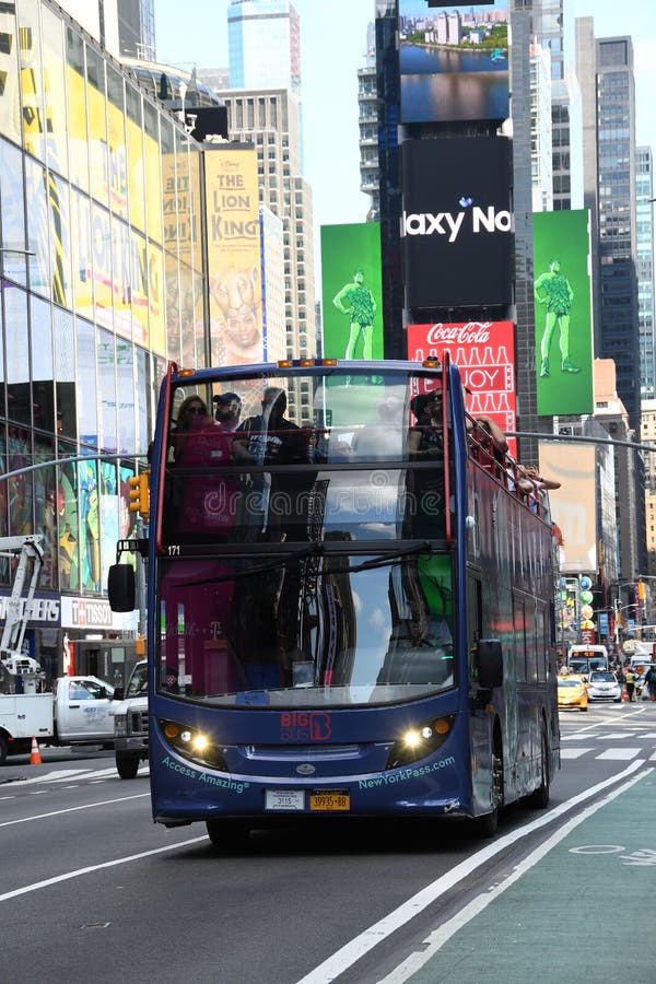 tour bus in times square new york city. editorial image