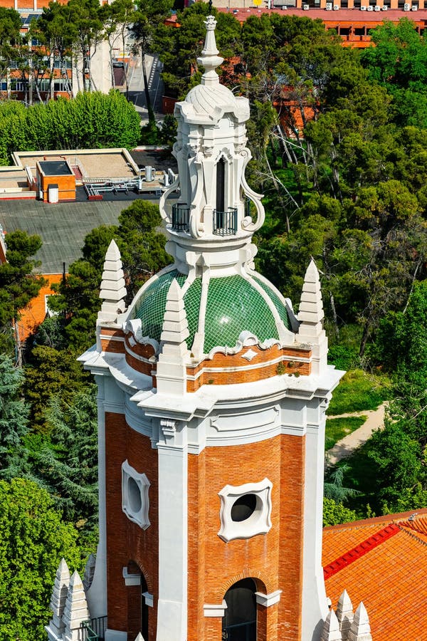 Tower of an old church in the city of Madrid next to the entrance of the Moncloa to the city. Tower of an old church in the city of Madrid next to the entrance of the Moncloa to the city