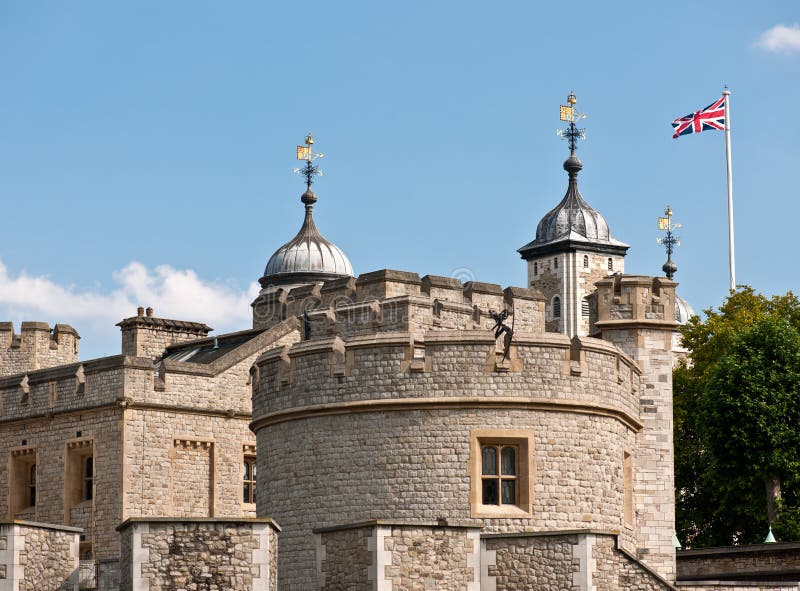 The Tower of London with waving British flag. The Tower of London with waving British flag.