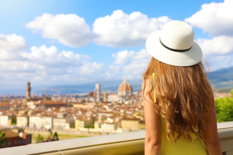 Tourism in Italy. Back view of young woman enjoying panoramic view of Florence city, Tuscany, Italy royalty free stock images Tourism in Italy. Back view of young woman enjoying panoramic view of Florence city, Tuscany, Italy royalty free stock images