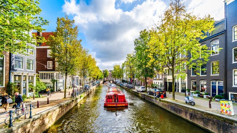 Tourist Canal Boasts in the Brouwersgracht Canal in Amsterdam, Holland stock photography Tourist Canal Boasts in the Brouwersgracht Canal in Amsterdam, Holland stock photography