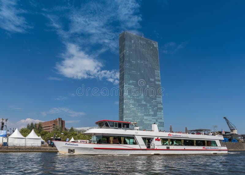 Tourist cruise boat on the Main river in front of the building of the European Central Bank, Frankfurt, Germany